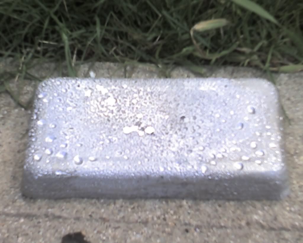 Pouring lead wheel weights Case Colt Ingersoll Tractors